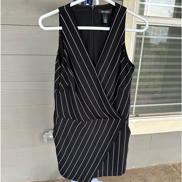 White House Black Market Dresses & Skirts - White House Black Market sleeveless one pc Romper shorts dress. Size 4